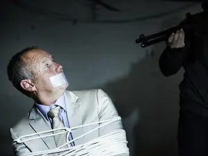 Trapped In A Box: The Exxon® Exec Who Didn't Make It Out Alive